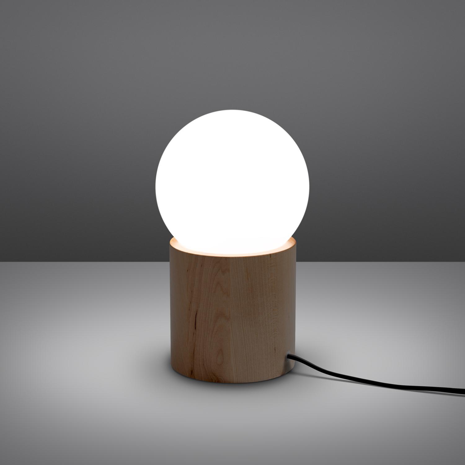 lámpara de mesa BOOMO: ilumina tu espacio con estilo. Su diseño moderno y elegante proporciona una luz suave y cálida, ideal para cualquier rincón de tu hogar. ¡Transforma tu ambiente!