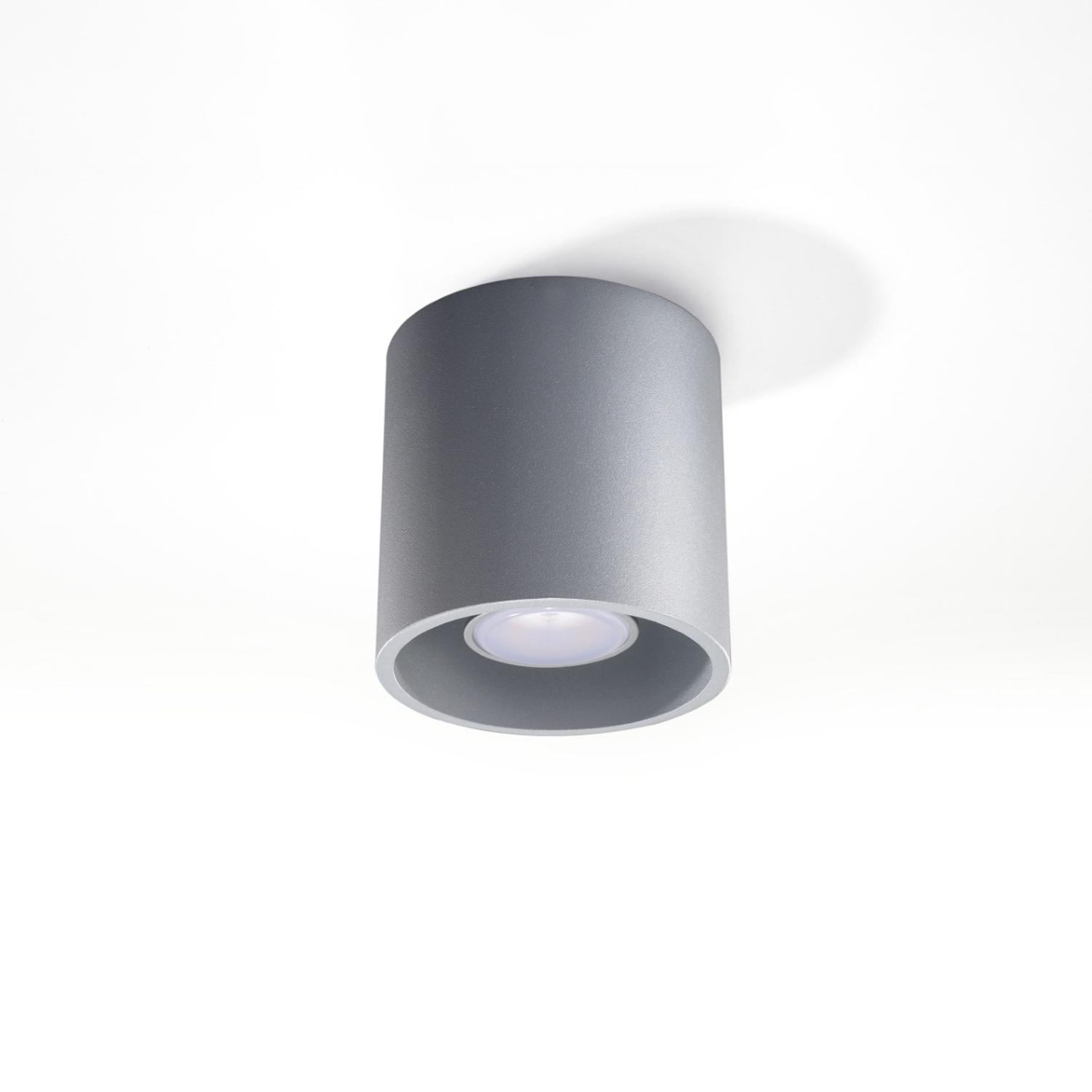 lámpara de techo ORBIS 1 en elegante color gris, ideal para iluminar espacios modernos. Su diseño minimalista y sofisticado la convierte en un elemento decorativo esencial.