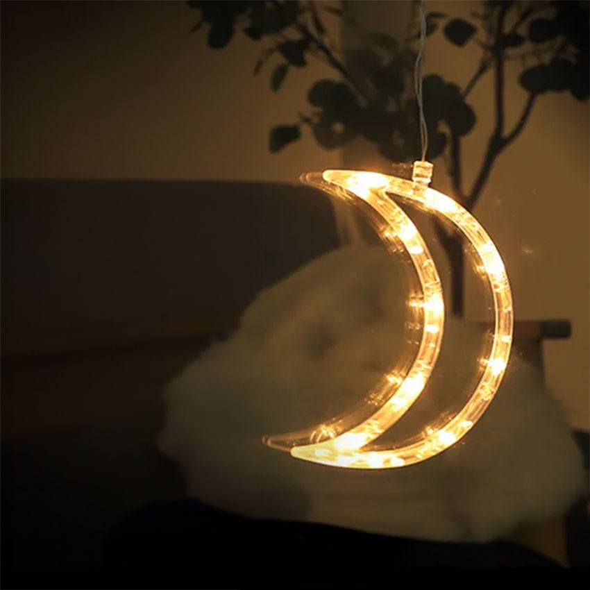 colgante a pilas con ventosa, luz blanca cálida, diseño de luna, ideal para decoración y ambientes relajantes.